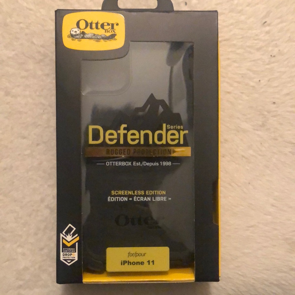 Black Otter Box Rugged Protection Defender series phone case